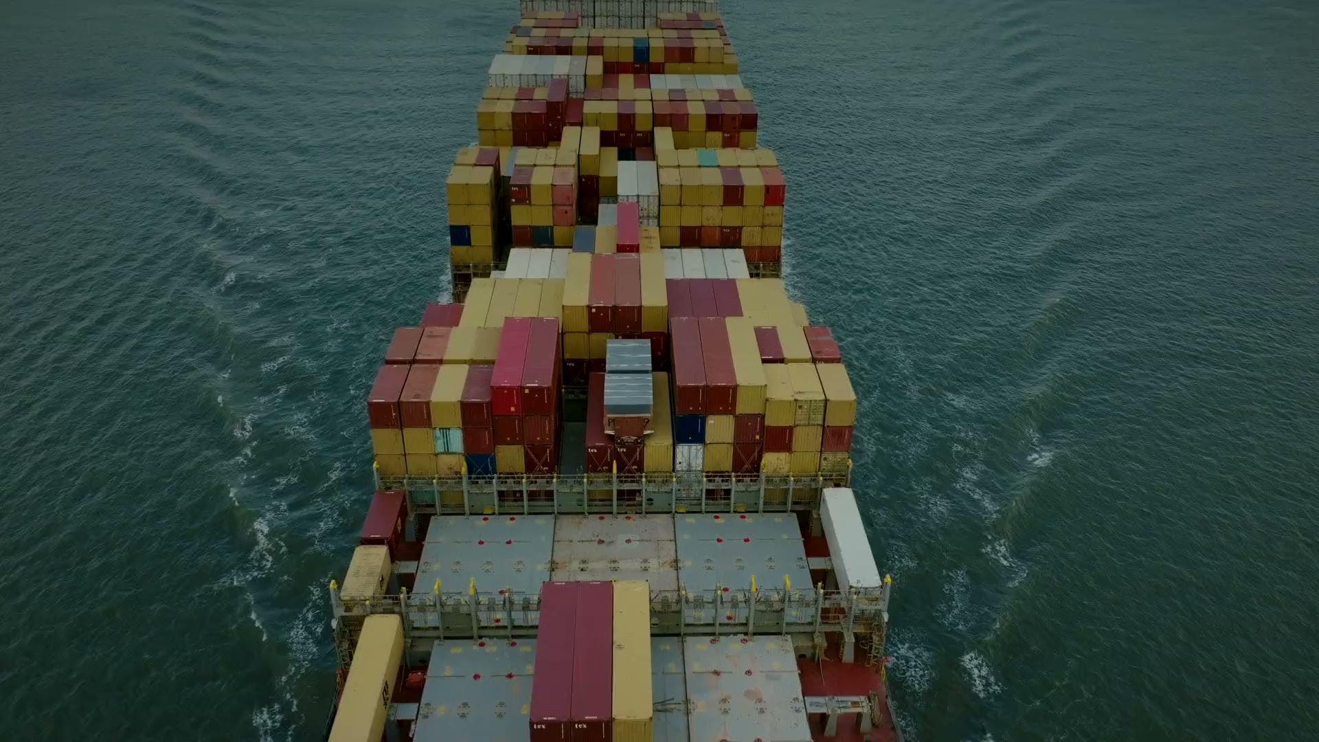 A loaded container ship seen from directly above